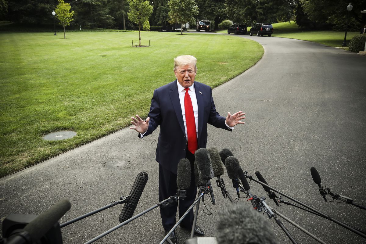 President Trump speaks to the media about the Mueller report before departing from the White House on July 24, 2019.