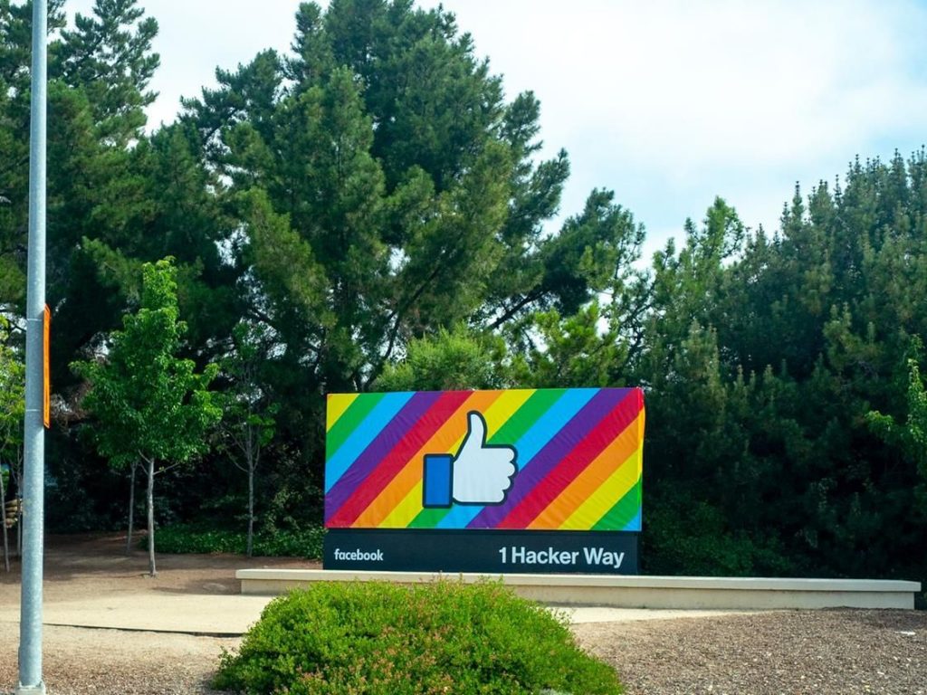 A Facebook thumbs-up billboard at One Hacker Way.