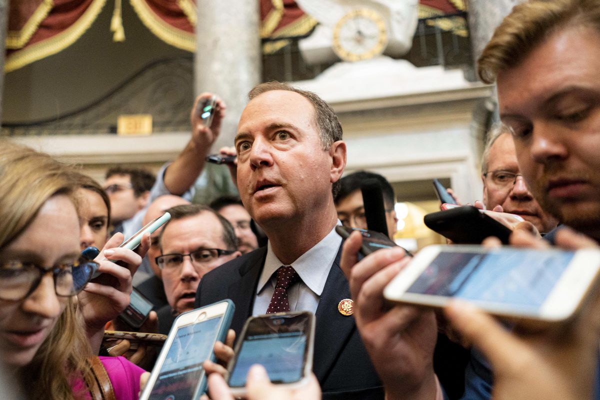 Chairman of the House Intelligence Committee Rep. Adam Schiff surrounded by reporters. 